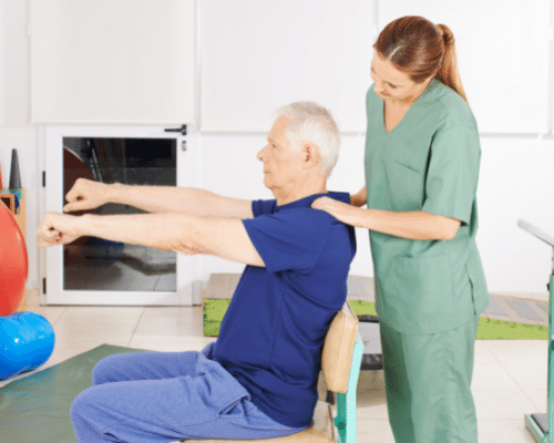 Man exercising with nurse